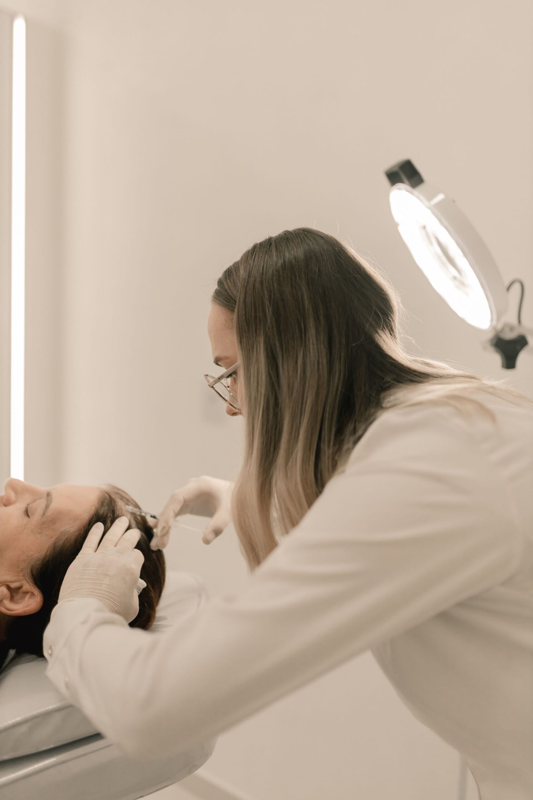 PRP hair restoration treatment - scalp evaluation at the clinic